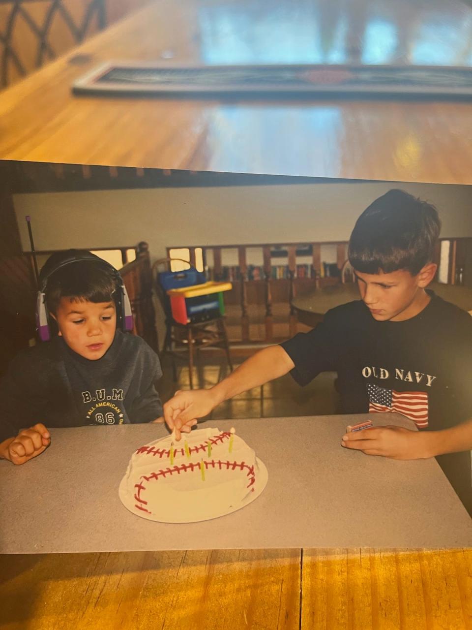 Shane, left, and Brandon Zylstra get ready for some birthday cake as kids.