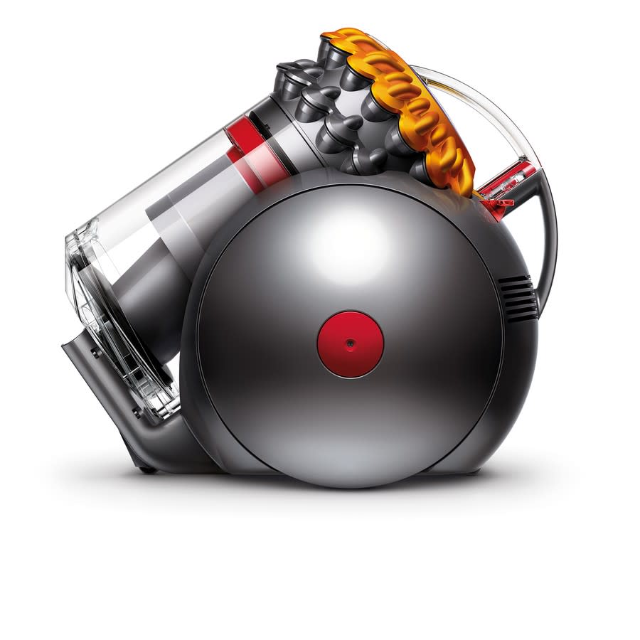 A small round featured Dyson Big Ball Origin Barrel Vacuum in grey, red and gold.
