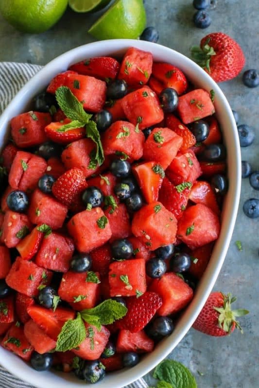 <p>A Farm Girl's Dabbles</p><p>The sweet lime and mint dressing makes this fruit salad anything but ordinary.</p><p><strong>Get The Recipe: <a href="https://www.afarmgirlsdabbles.com/mojito-fruit-salad/" rel="nofollow noopener" target="_blank" data-ylk="slk:Mojito Fruit Salad;elm:context_link;itc:0;sec:content-canvas" class="link ">Mojito Fruit Salad</a></strong></p>