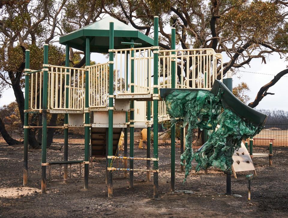 A playground stands, plastic melted by the blaze, after a bushfire on Kangaroo Island, South Australia. 