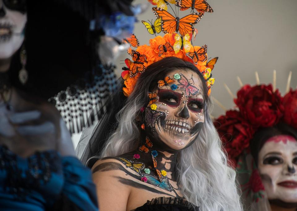 Itzel Crespo competes in the Catrina pageant at the annual Dia De Los Muertos Community Street Fiesta at the Mexican Heritage Center in downtown Stockton on Saturday, Oct. 29, 2022.