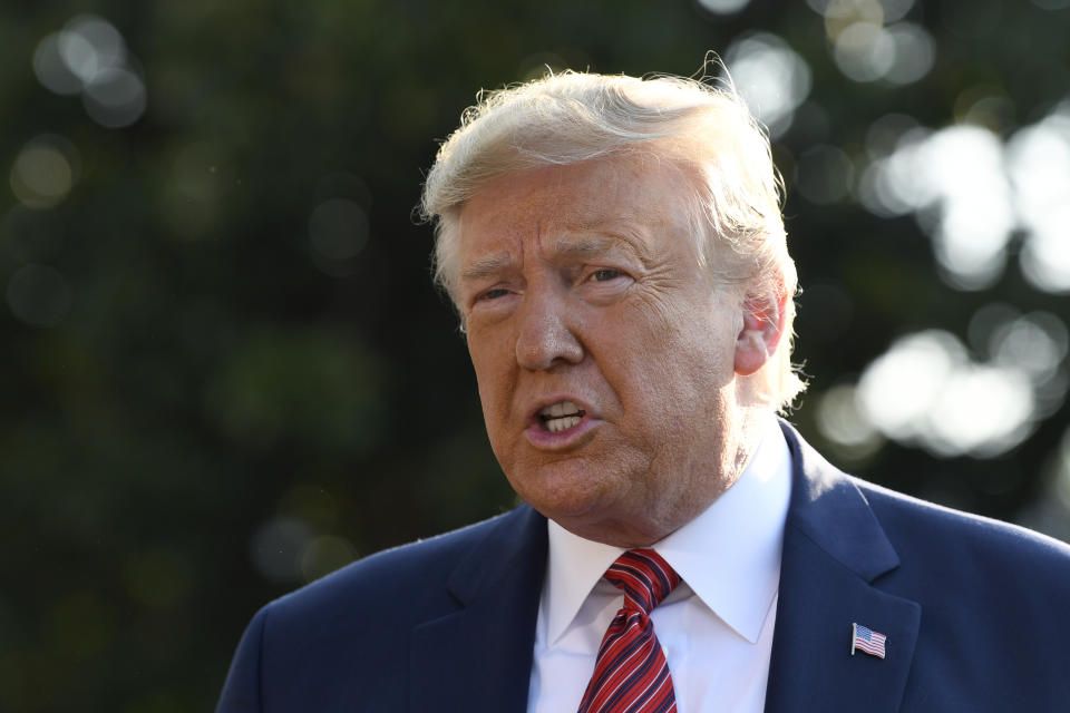 President Donald Trump talks with reporters on the South Lawn of the White House in Washington, Sunday, Sept. 22, 2019, as he prepares to board Marine One for the short trip to Andrews Air Force Base. Trump is traveling to Texas and Ohio before heading to New York for the upcoming United Nations General assembly. (AP Photo/Susan Walsh)