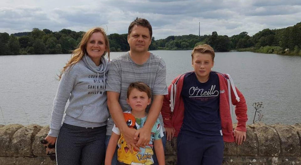 Sarah Frith and Gareth Heslop with their sons Lewis and Euan, before her diagnosis. (Supplied)