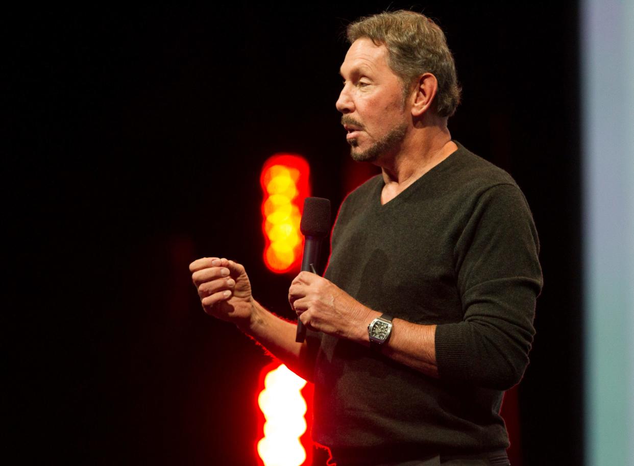 Larry Ellison talking into microphone