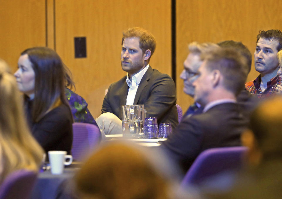 Britain's Prince Harry attends a sustainable tourism summit at the Edinburgh International Conference Centre in Edinburgh, Scotland, Wednesday, Feb. 26, 2020. (Andrew Milligan/Pool Photo via AP)