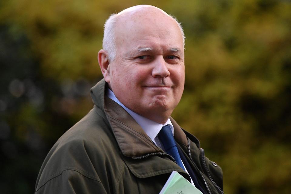 Pro-Brexit European Research Group (ERG) member Conservative MP Iain Duncan Smith holds a copy of the European Union (Withdrawal Agreement) Bill as he leaves from 10 Downing Street in central London on October 22, 2019. - British Prime Minister Boris Johnson launched a charm offensive on Friday to sell his Brexit deal to sceptical MPs, with a looming vote in parliament resting on a knife-edge. (Photo by DANIEL LEAL-OLIVAS / AFP) (Photo by DANIEL LEAL-OLIVAS/AFP via Getty Images)