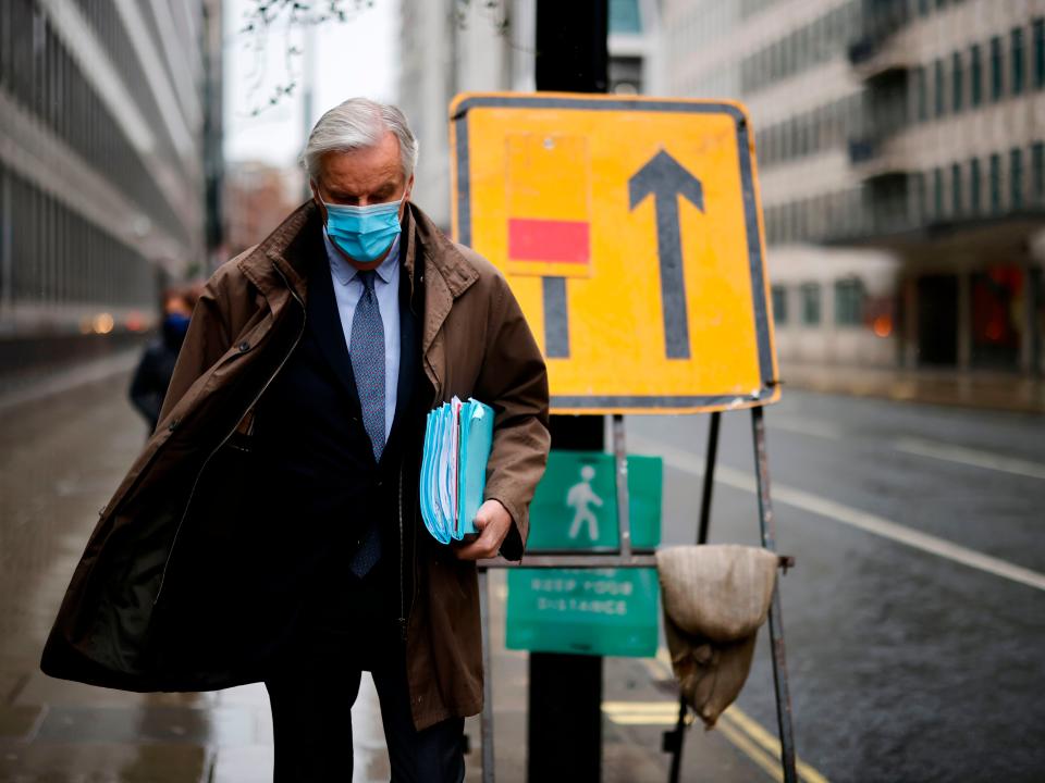 EU chief negotiator Michel Barnier walks to a conference centre in central London on Thursday for trade talks (Tolga Akmen/AFP via Getty Images)