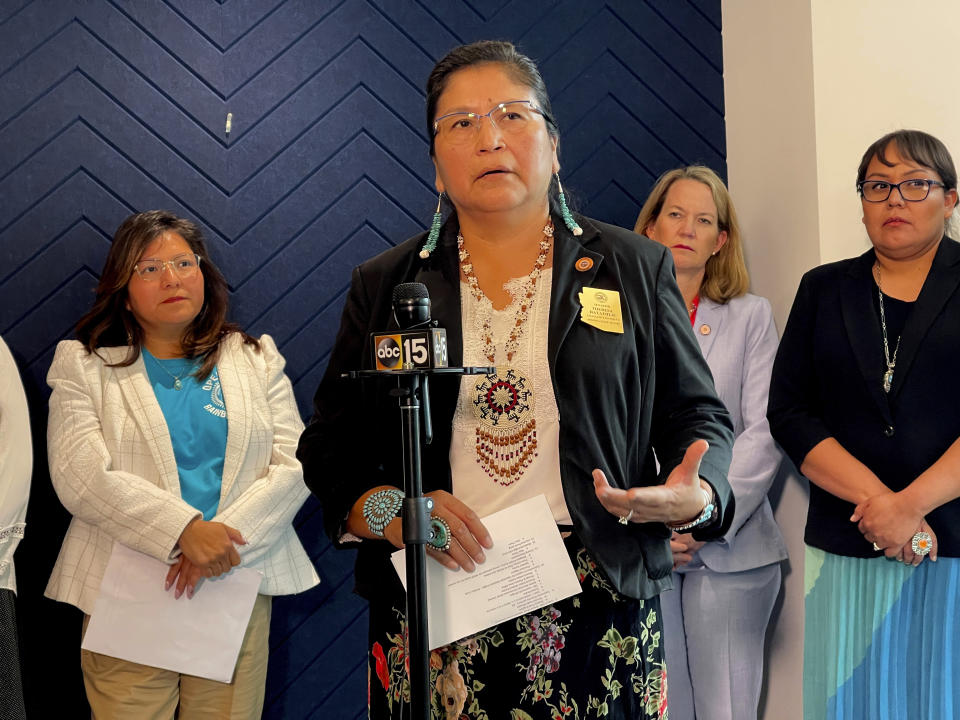 Arizona State Sen. Theresa Hatathlie talks during a news conference on Friday, May 19, 2023. Hatathlie outlined steps the Navajo Nation is taking to find and get care for tribal members now being displaced by scores of illegitimate sober living homes that are under investigation for Medicaid fraud by the Arizona Attorney General's Office. Authorities say the homes illegally billed the state for Medicaid money and never provided needed services. Behind her, on the left is Rhonda Tuni, the executive director of the Navajo Department of Health, and on the right is Arizona Attorney General Kris Mayes. (AP Photo/Anita Snow)