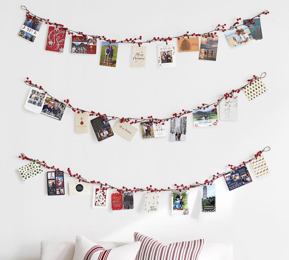 <p><a href="https://go.redirectingat.com?id=74968X1596630&url=https%3A%2F%2Fwww.potterybarn.com%2Fproducts%2Fberry-garland-christmas-card-holder&sref=https%3A%2F%2Fwww.womansday.com%2Fhome%2Fcrafts-projects%2Fhow-to%2Fg1998%2Fchristmas-card-holder%2F" rel="nofollow noopener" target="_blank" data-ylk="slk:Shop Now;elm:context_link;itc:0;sec:content-canvas" class="link ">Shop Now</a></p><p>Berry Garland Christmas Card Holder</p><p>potterybarn.com</p><p>$59.00</p>