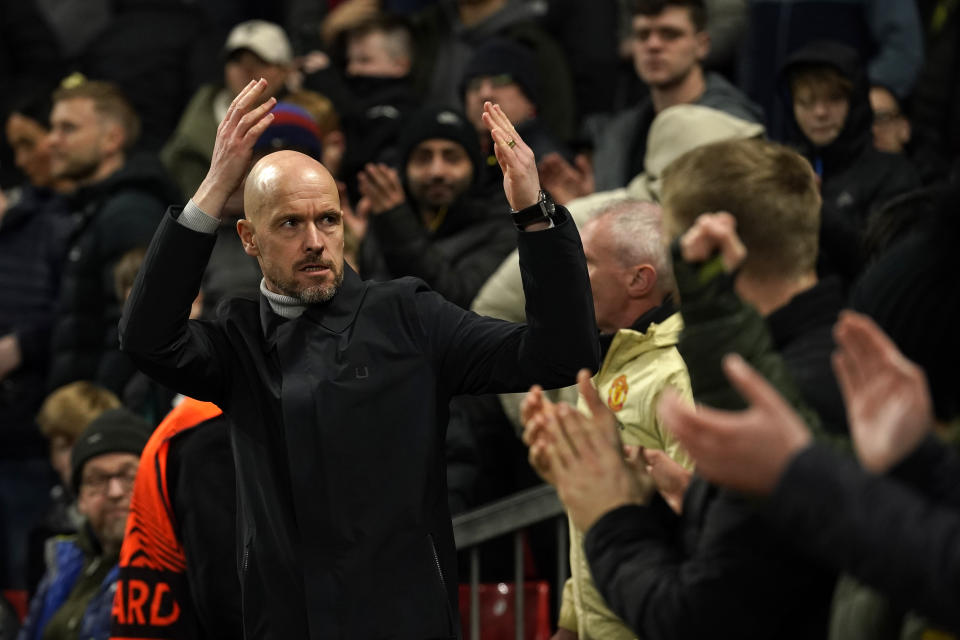 Manchester United's head coach Erik ten Hag gestures during the Europa League playoff second leg soccer match between Manchester United and Barcelona at Old Trafford stadium in Manchester, England, Thursday, Feb. 23, 2023. (AP Photo/Dave Thompson)