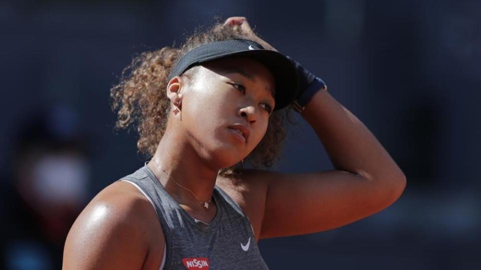 Naomi Osaka of Japan reacts during her match against Karolina Muchova of the Czech Republic on Sunday, May 2, 2021. (AP Photo/Paul White)