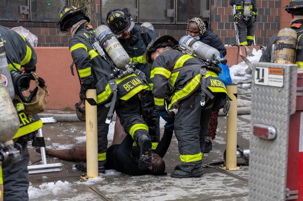 Thirty people, including several children, were critically injured, with firefighters making dramatic rescues using tower ladders and ladders, after a fire broke out inside a third-floor duplex apartment at 333 East 181st St. in the Bronx on Sunday, Jan. 9, 2022.