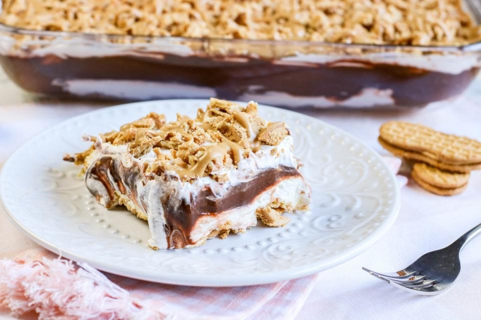 <p>Moore or Less Cooking</p><p>No-Bake Peanut Butter Cheesecake Lasagna is an easy yummy dessert to make for parties or potlucks!</p><p><strong>Get the recipe: </strong><a href="https://mooreorlesscooking.com/peanut-butter-chocolate-lasagna/" rel="nofollow noopener" target="_blank" data-ylk="slk:Peanut Butter Chocolate Lasagna;elm:context_link;itc:0;sec:content-canvas" class="link "><strong>Peanut Butter Chocolate Lasagna</strong></a></p>