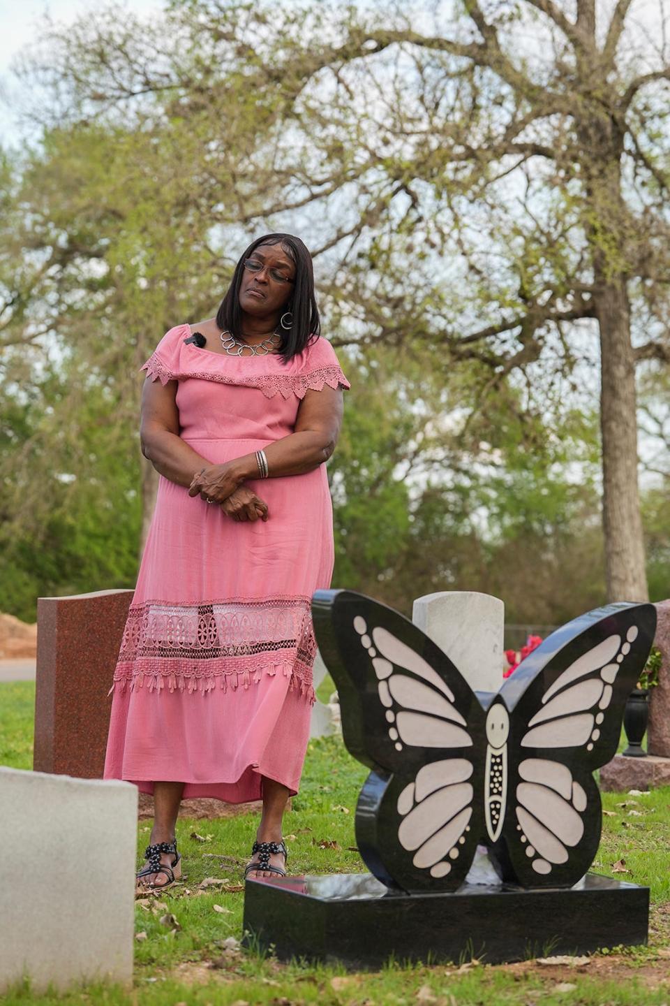 Carolyn White-Mosley visits the gravesite of her daughter, Ortralla Mosley, in East Austin nearly 20 years after her death on Monday, Feb. 6, 2023.