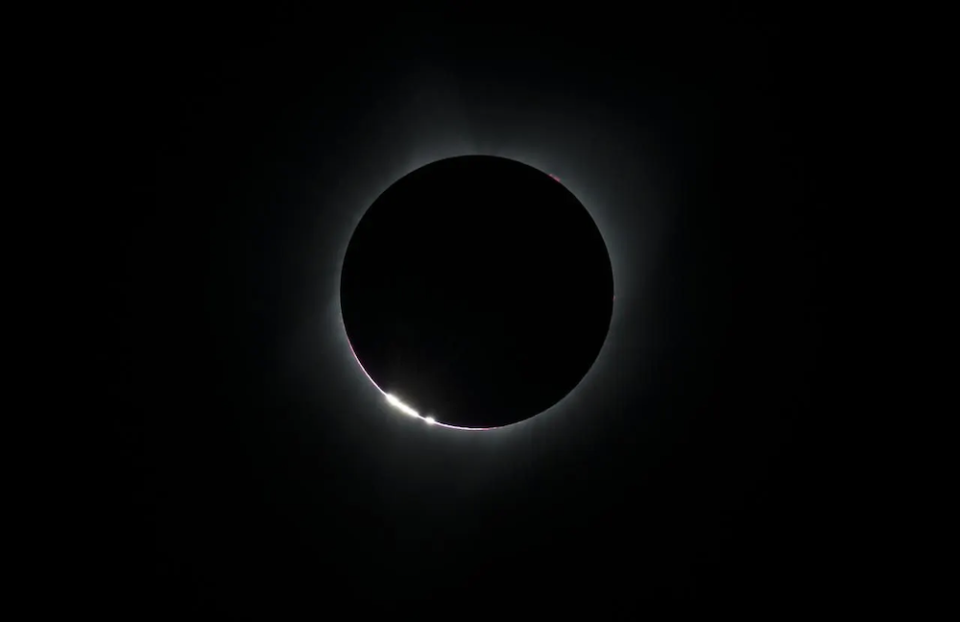 Total solar eclipse showcasing Baily's beads