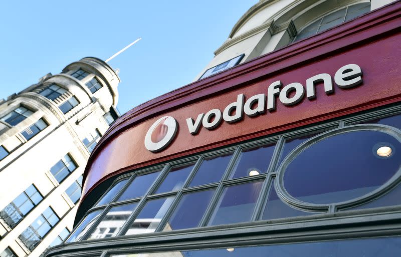 FILE PHOTO: Branding for Vodafone is seen on the exterior of a shop in London, Britain