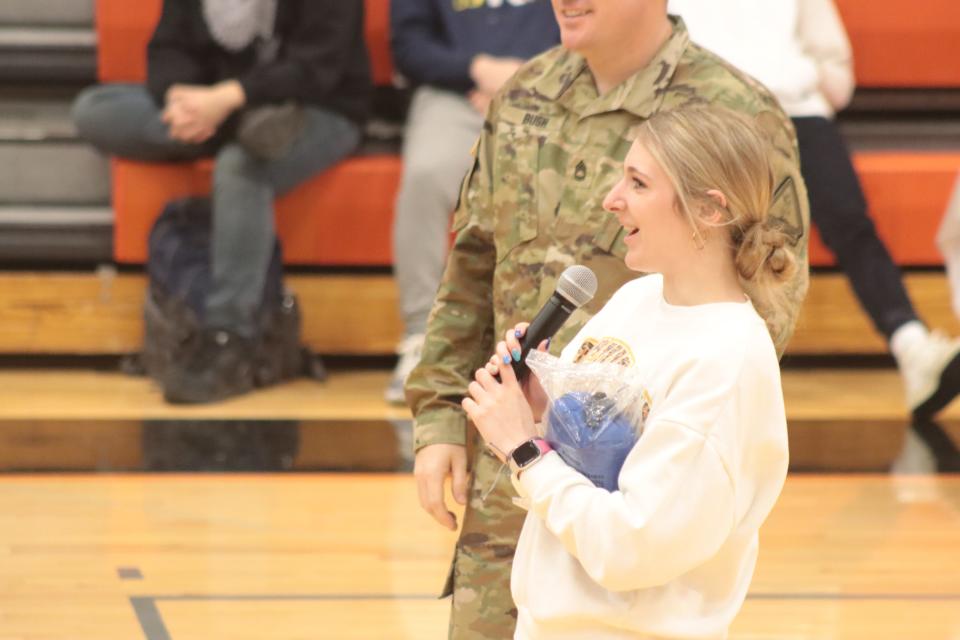 Tecumseh High School senior Makayla Sanders asks a question during an assembly Friday, March 24, 2023, at Tecumseh High School with the Michigan Army National Guard and University of Michigan student-athletes.