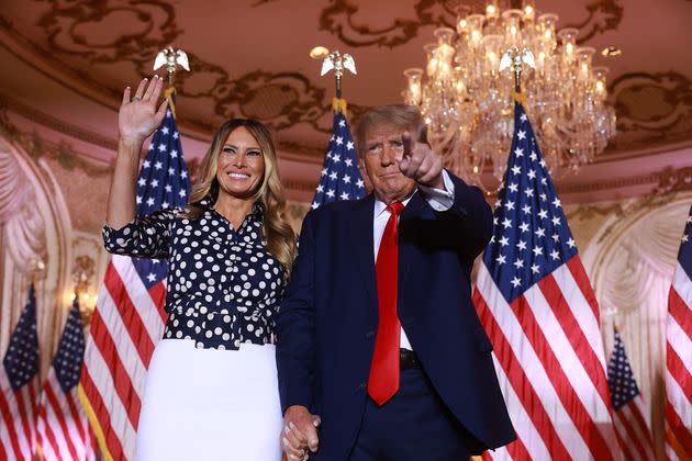 Former U.S. President Donald Trump and former first lady Melania Trump stand together during an event at his Mar-a-Lago home on Nov. 15, 2022, in Palm Beach, Florida. 