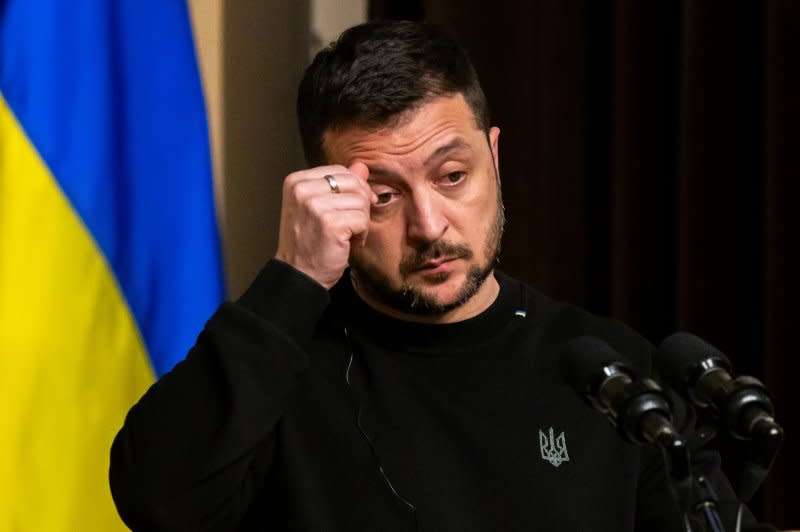 Ukrainian President Volodymyr Zelensky speaks to the media in Washington on December 12. Photo by Julia Nikhinson/UPI