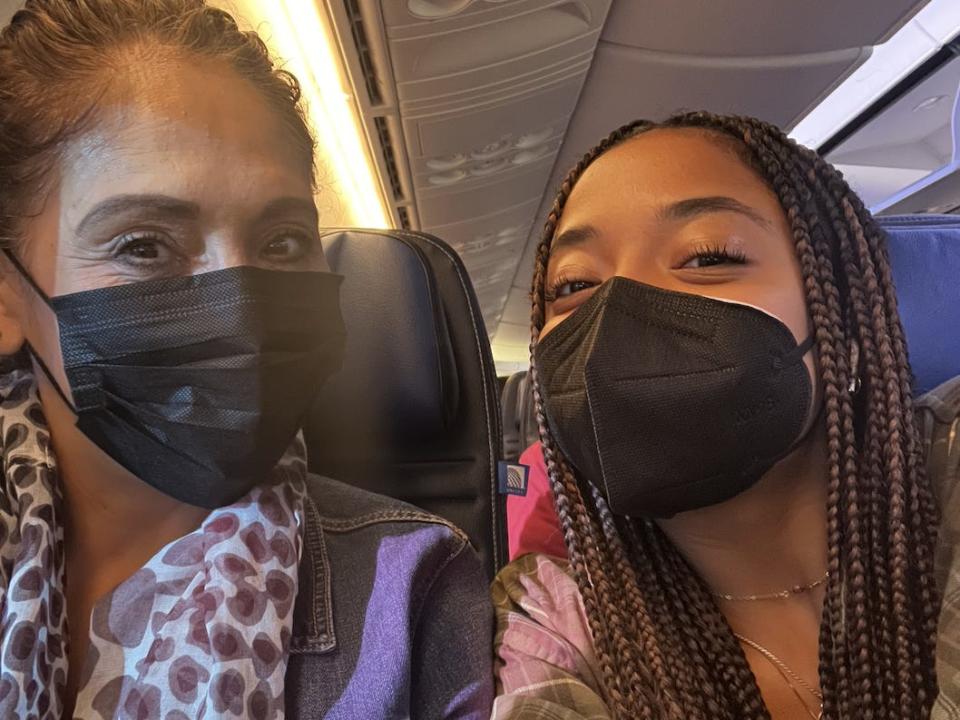 Pauline Villegas and her mother in the airplane flying to NYC.