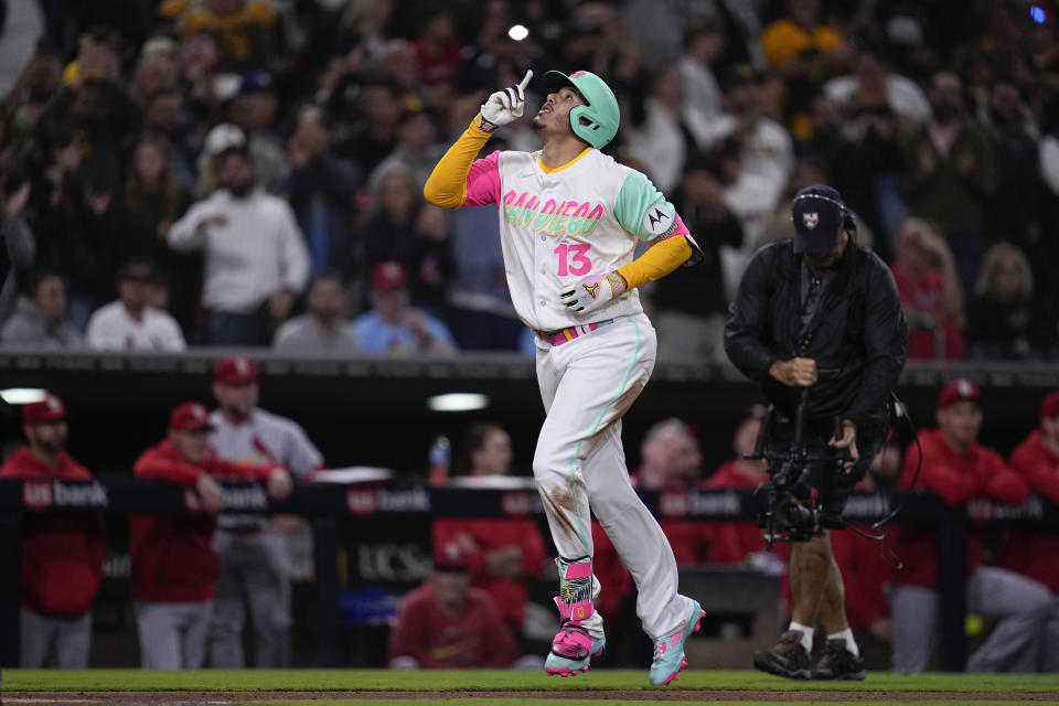 San Diego Padres' Manny Machado celebrates after hitting a two-run home run during the eighth inning of a baseball game against the St. Louis Cardinals, Friday, Sept. 22, 2023, in San Diego. (AP Photo/Gregory Bull)