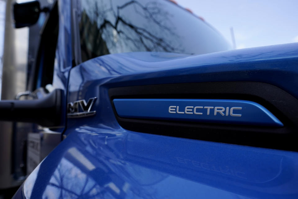FILE - An International Electric MV Series truck is on display in Austin, Texas, Feb. 22, 2023. A report released Wednesday, June 7, 2023, by the International Energy Agency says that demand for energy is growing, yet emissions are not growing as fast. (AP Photo/Eric Gay, File)