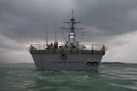 The U.S. Navy guided-missile destroyer USS John S. McCain is seen after a collision, in Singapore waters August 21, 2017. REUTERS/Ahmad Masood