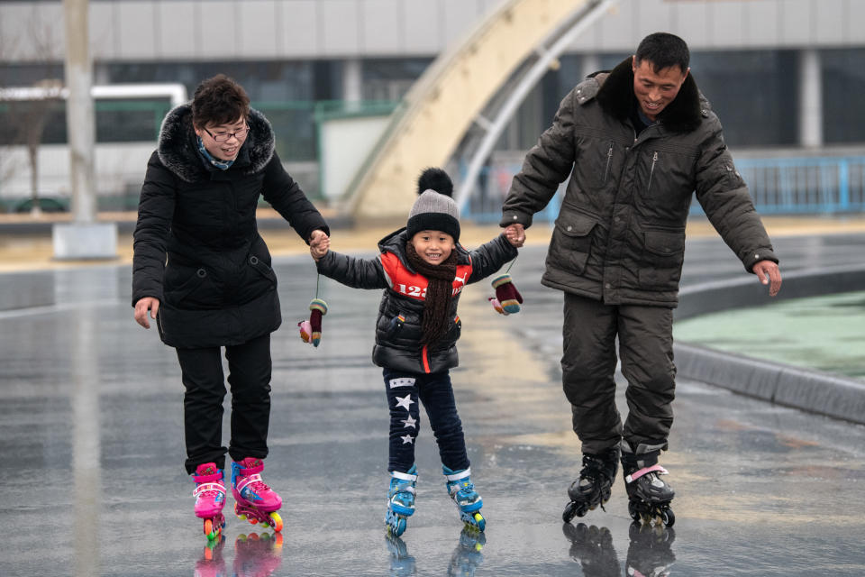A North Korean child learns how to rollerblade at a skate park on Feb. 6, in Pyongyang.