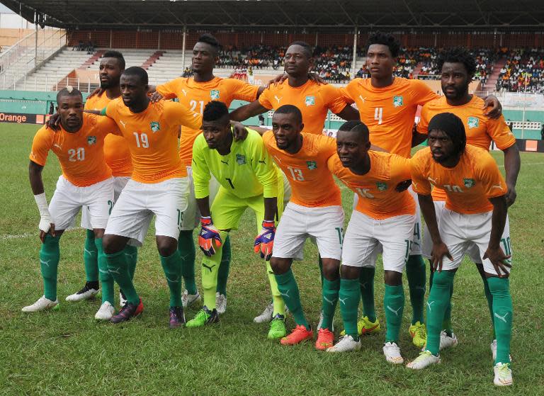 Members of the Ivory Coast national team pose for a group photo prior to their friendly football match Angola vs Ivory Coast on March 26, 2015 in Abijan