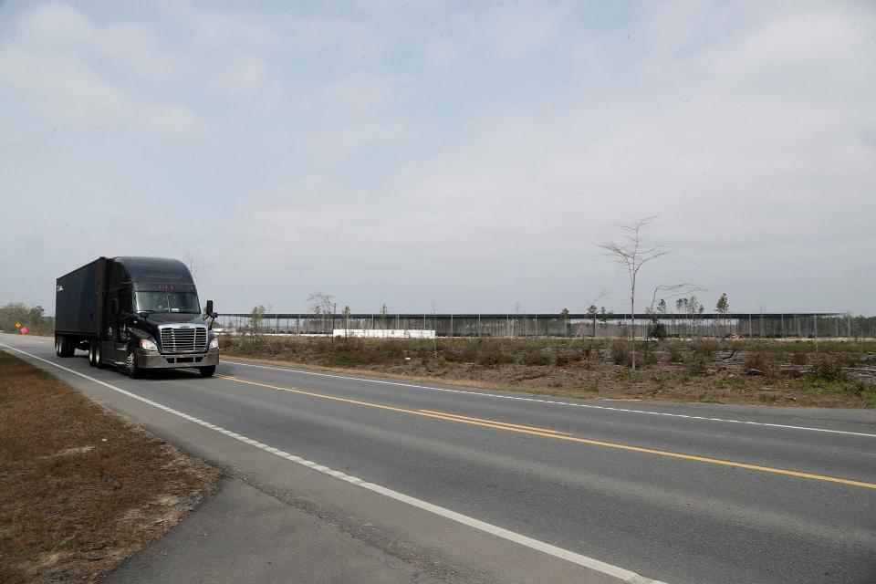 A semi passes the future Georgia International Commerce Center on US 80 near Ellabell, Georgia.