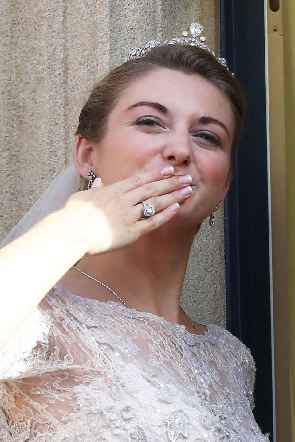 LUXEMBOURG - OCTOBER 20: Princess Stephanie of Luxembourg blows a kiss to the crowds from the balcony of the Grand-Ducal Palace following the wedding ceremony of Prince Guillaume Of Luxembourg and Princess Stephanie of Luxembourg at the Cathedral of our Lady of Luxembourg on October 20, 2012 in Luxembourg, Luxembourg. The 30-year-old hereditary Grand Duke of Luxembourg is the last hereditary Prince in Europe to get married, marrying his 28-year old Belgian Countess bride in a lavish 2-day ceremony. (Photo by Andreas Rentz/Getty Images)