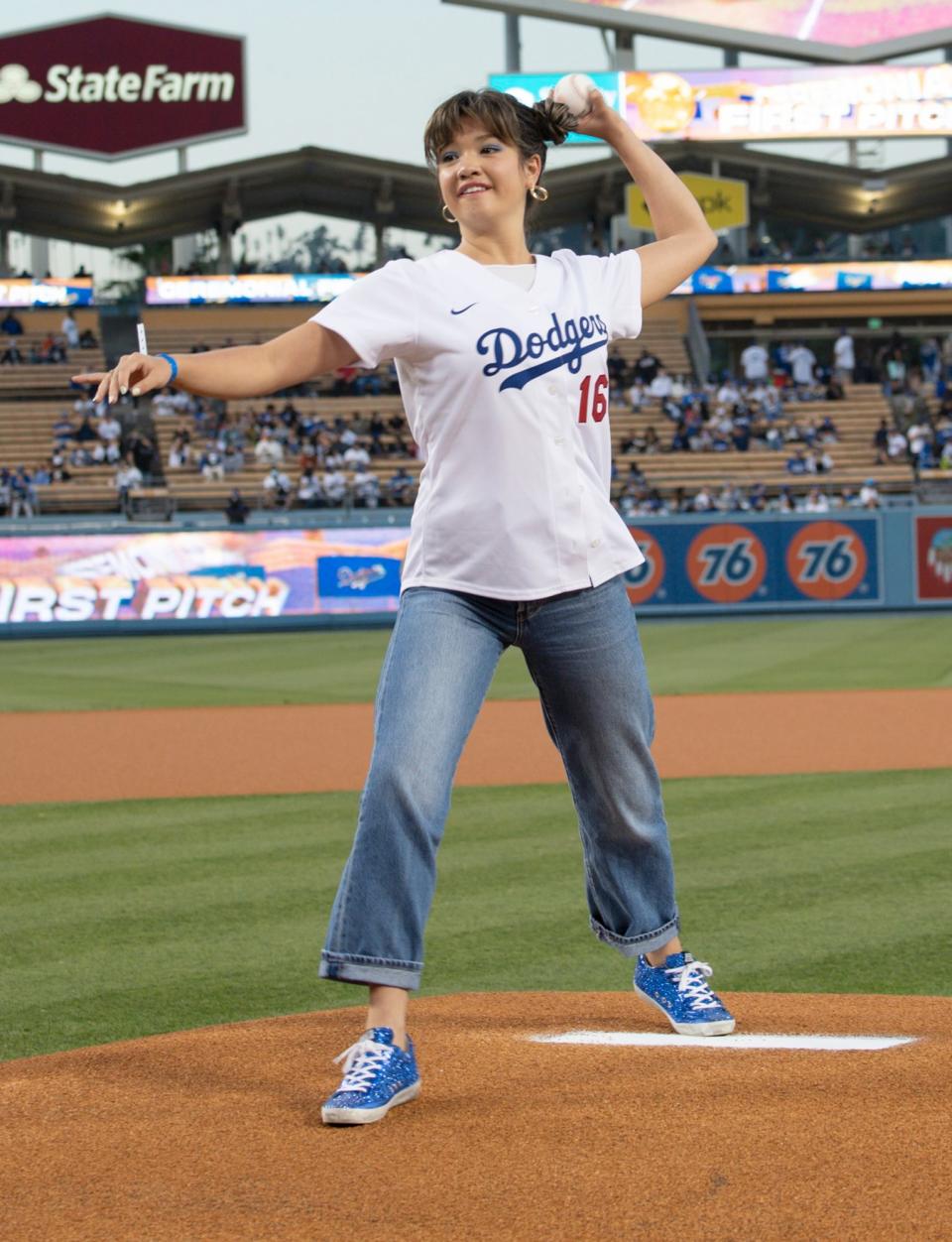 <p><i>Doogie Kamealoha, M.D.</i> star Peyton Elizabeth Lee throws the first pitch at the L.A. Dodgers game at Dodger Stadium on Sept. 14 in L.A. </p>