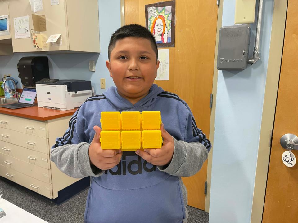 Henry Garcia-Miranda, 11, explored solar energy with the use of “solar panels” printed by a 3D printer at Farragut Intermediate School, May 9, 2024.