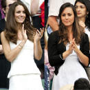 <b>Kate Middleton at Wimbledon 2011 (left) and 2008 (right) </b><br><br>The Duchess of Cambridge has opted for the traditional Wimbledon uniform of white for her trip to watch the tennis. She looks visibly younger in 2008 (when she's popped on a cardi to keep warm) and you can see that she's grown much more confident since then.<br><br>© Rex