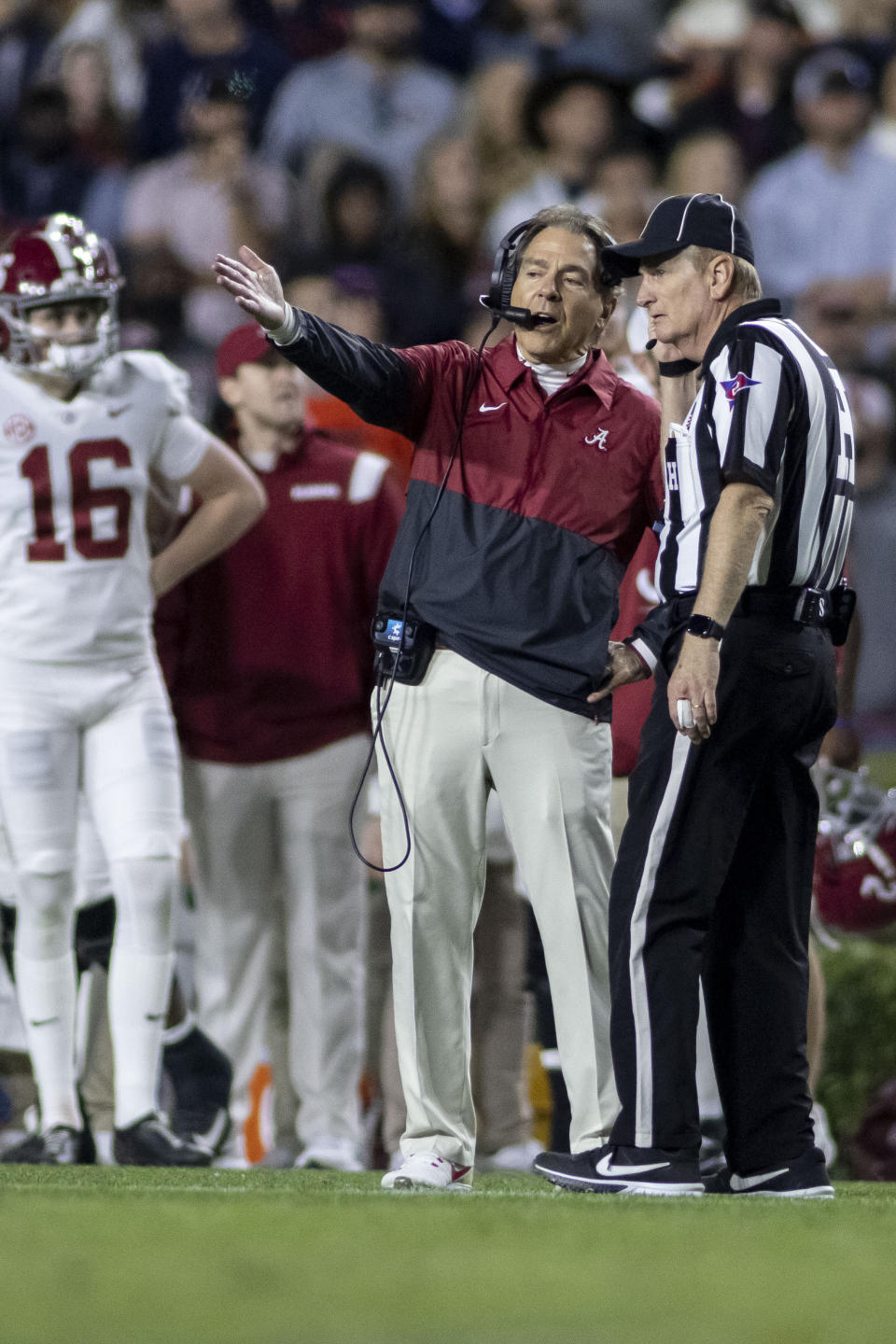 Alabama head coach Nick Saban argues a call during the second half of an NCAA college football game against Auburn, Saturday, Nov. 27, 2021, in Auburn, Ala. (AP Photo/Vasha Hunt)