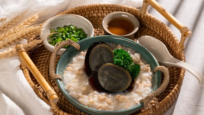 Congee served with century egg
