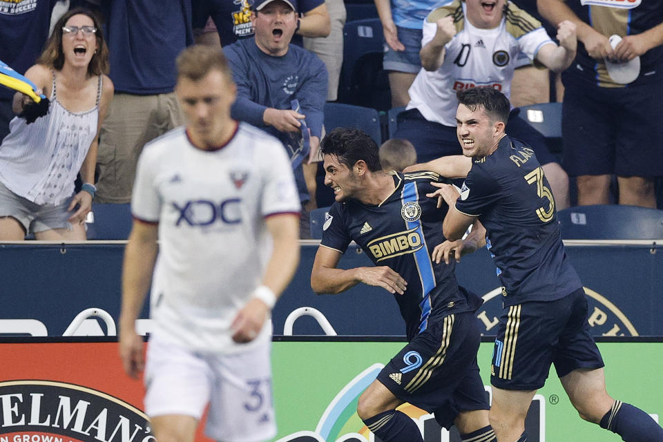 CHESTER, PENNSYLVANIA - JULY 08: Julián Carranza #9 (C) and Leon Flach #31 of Philadelphia Union celebrate a goal by Carranza during the first half against D.C. United at Subaru Park on July 08, 2022 in Chester, Pennsylvania. (Photo by Tim Nwachukwu/Getty Images)