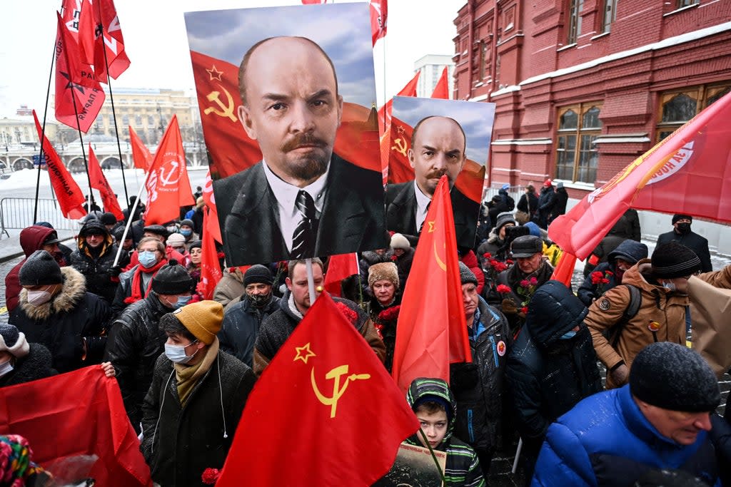 Russian Communist Party supporters walk towards the mausoleum of Lenin in January (AFP via Getty Images)