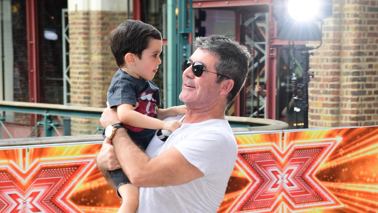 Simon Cowell and son Eric Cowell attending X Factor filming in 2017. (Photo by Ian West/PA Images via Getty Images)