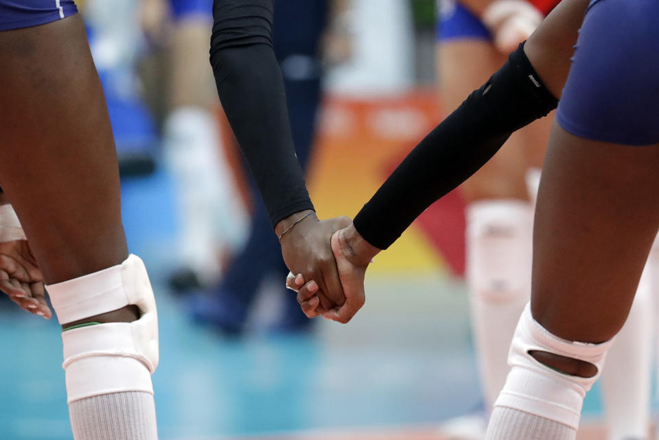 Preliminary volleyball hand holding