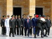 Turkey's Prime Minister Binali Yildirim (C), flanked by Chief of Staff General Hulusi Akar (3rd L) and the country's top generals, attends a wreath-laying ceremony in Anitkabir, the mausoleum of modern Turkey's founder Mustafa Kemal Ataturk, ahead of a High Military Council meeting in Ankara, Turkey, July 28, 2016. REUTERS/Umit Bektas