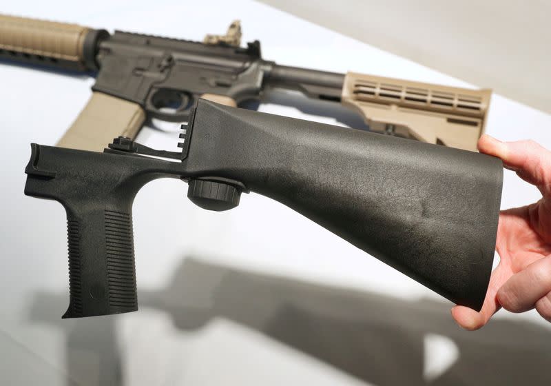 FILE PHOTO: A bump fire stock that attaches to a semi-automatic rifle to increase the firing rate is seen at Good Guys Gun Shop in Orem