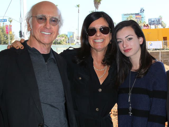 <p>David Livingston/Getty</p> Larry David, Laurie David and Cazzie David attend the official Emerson College Los Angeles groundbreaking ceremony on March 8, 2012 in Los Angeles, California.