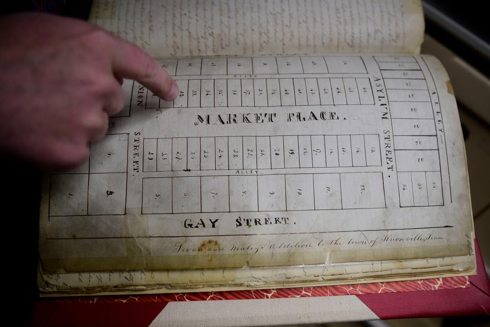 The deed from the mid 1800s to the lots of downtown's Market Square are scanned in the archival rooms at the East Tennessee History Center in Knoxville.