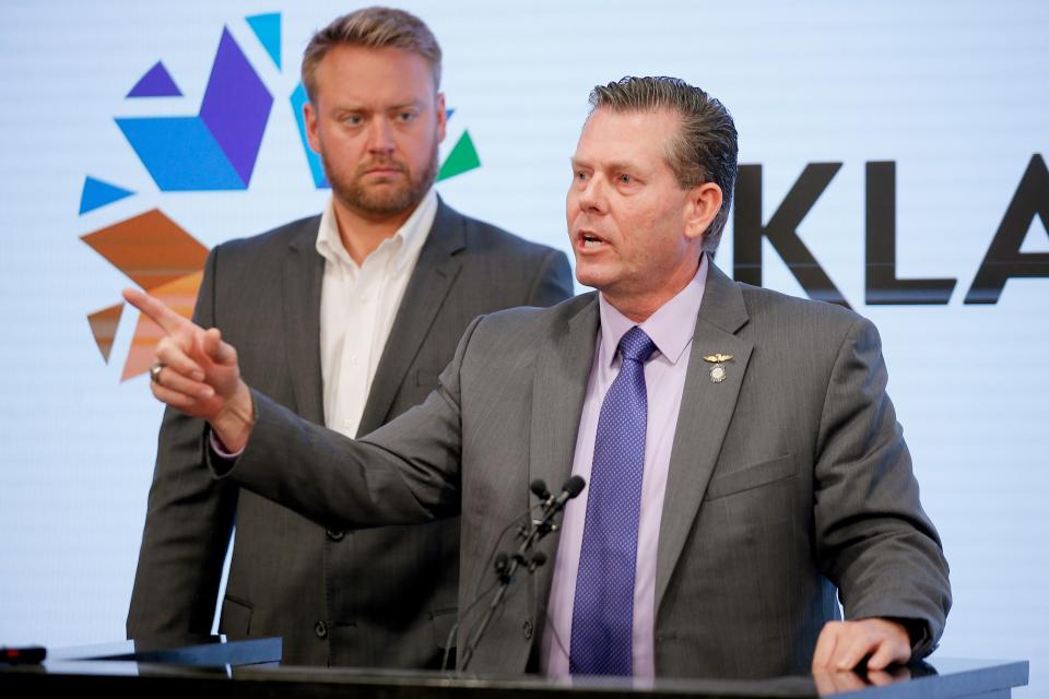 Rep. Kevin McDugle, right, and Rep. Mickey Dollens talk about the need for an independent investigation into the case of death row inmate Richard Glossip during a press conference at the state Capitol in Oklahoma City in 2021.