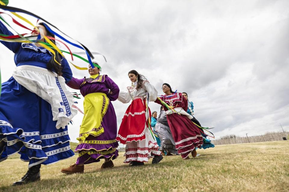 A group of women perform a Choctaw dance.