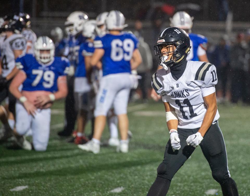 Bellingham High School senior Anthony DaSilva celebrates as time winds down defeating Ashland, 27-21, Sept. 29, 2023.