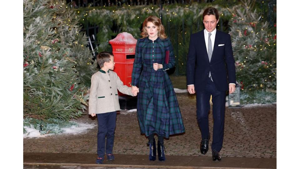 The eldest York daughter rounded off her Christmassy ensemble with midnight blue suede boots