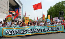 Demonstrators march down Pennsylvania Avenue during a People's Climate March, to protest U.S. President Donald Trump stance on the environment, in Washington, U.S., April 29, 2017. REUTERS/Mike Theiler