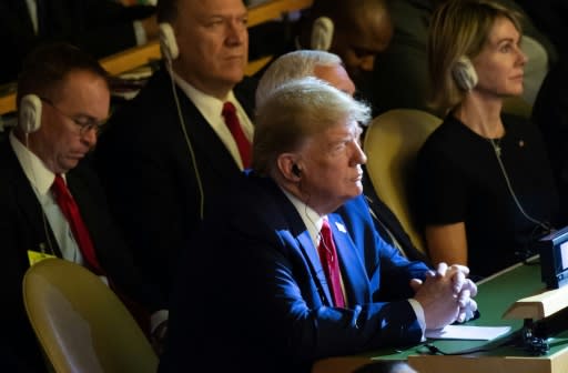 President Donald Trump made a brief unscheduled appearance at the UN climate summit, which he had been expected to skip entirely